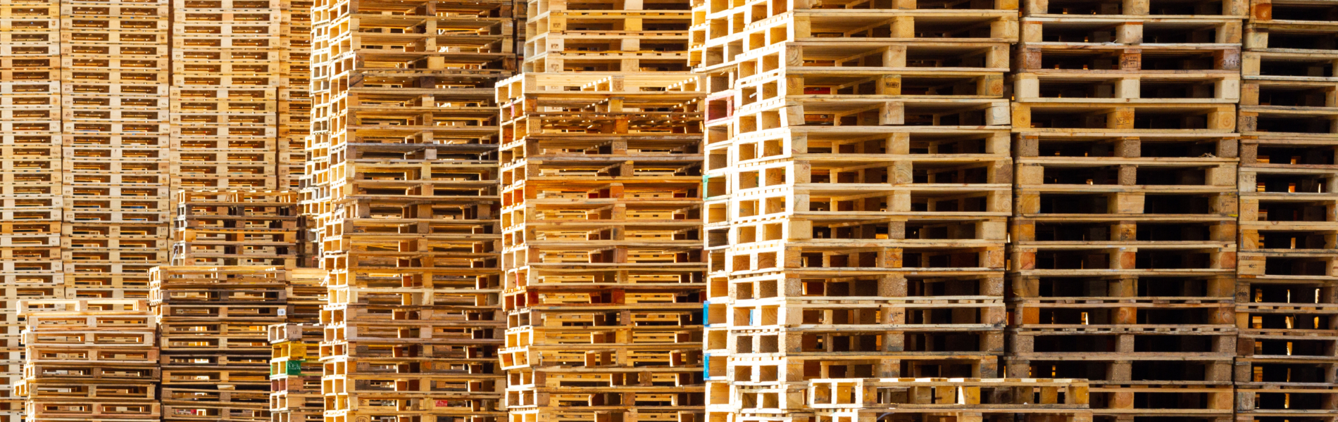 Large Stacks Of Pallets Outside