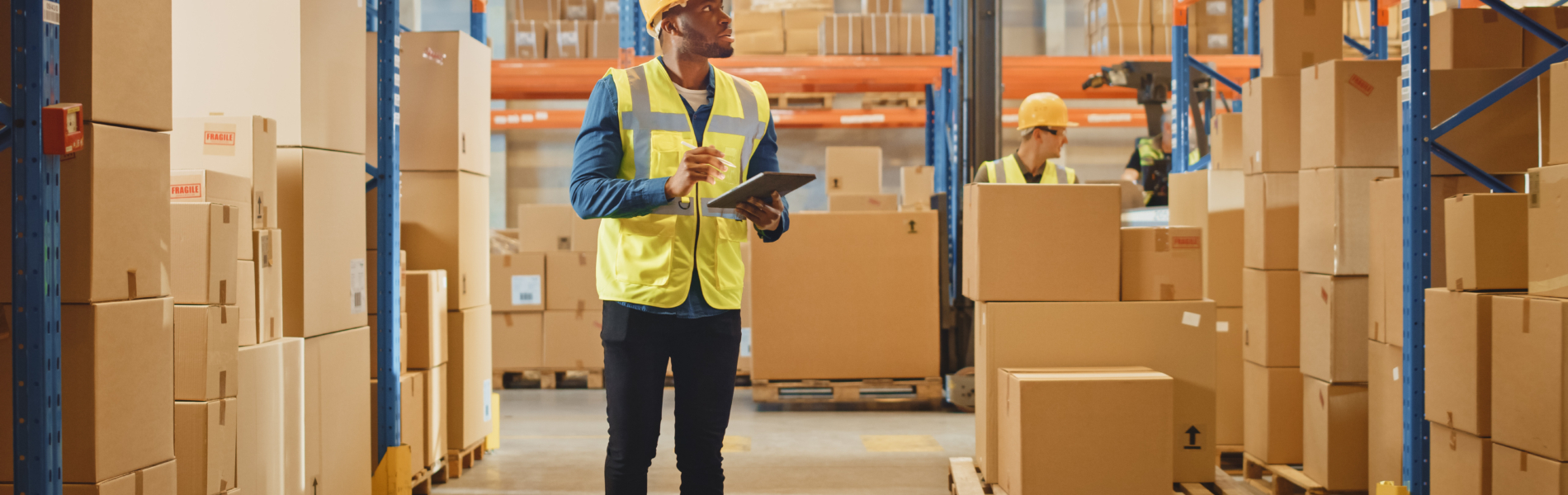 Handsome Male Worker Wearing Hard Hat Holding Digital Tablet Com